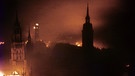 Blick auf München während eines Bombenangriffs im Zweiten Weltkrieg | Bild: picture-alliance/dpa
